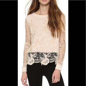 Free People “Pretty Rad” lace split back cream sweatshirt . NWT